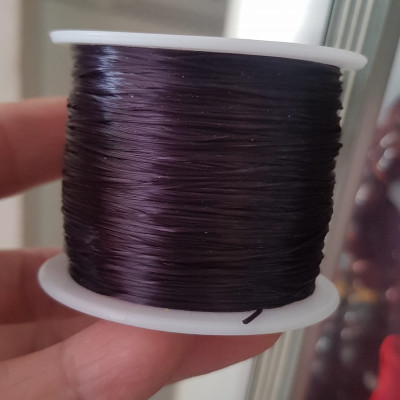 Cuộn Dây Thun CO GIÃN màu Đen xỏ vòng hạt chuỗi Dây này là dây thun chuyên xỏ vòng chuỗi màu Đen, có đủ màu Anh Chị đang đeo chuỗi muốn thay dây khác cho vòng thì đặt cuộn Thun chỉ này nhé