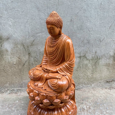 Tượng phật thích ca mâu ni được làm bằng chất liệu gỗ hương đá kt 40×22×21cm