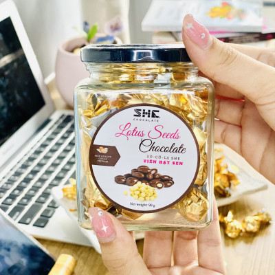 Socola viên Hạt sen - Hũ thủy tinh 90G - SHE Chocolate - Bổ sung năng lượng, đa dạng vị giác. Quà tặng sức khỏe, quà tặng người thân, dịp lễ, thích hợp ăn vặt