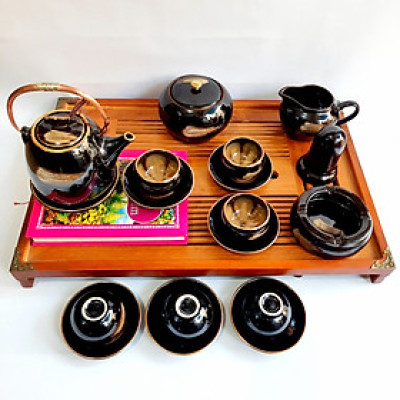 Bộ ấm chén Bát Tràng cao cấp “hoa trong lòng gốm” men hoả biến hổ phách viền vàng 24k