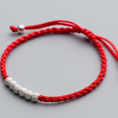 Combo 2 vòng thắt dây đỏ charm bạc - Ngọc Quý Gemstones