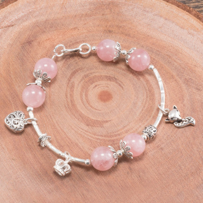 Vòng tay thạch anh hồng phối charm hồ ly bạc (10mm) Ngọc Quý Gemstones