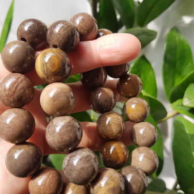 Vòng Gỗ Hóa Thạch Nam 16mm Màu Sáng Bóng Tự nhiên Gỗ Hóa Thạch Đẹp Nam đeo size vòng 16mm sang tay ạ