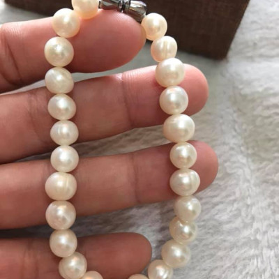 Vòng NGỌC TRAI NỮ ĐEO SIZE 7LY5 VÒNG GỒM 25 HẠT ĐÚNG CUNG SANH  MÀU TRẮNG 